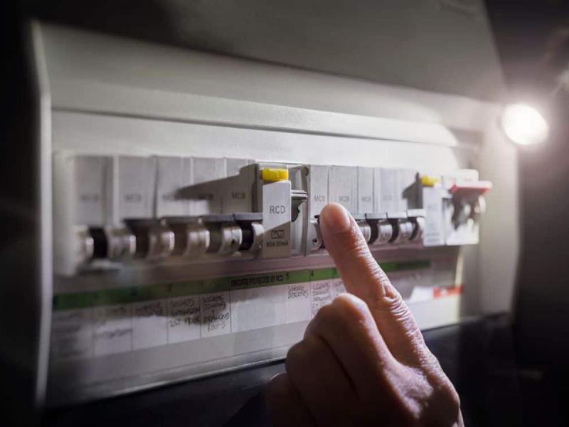 Resetting a tripped circuit breaker by torchlight