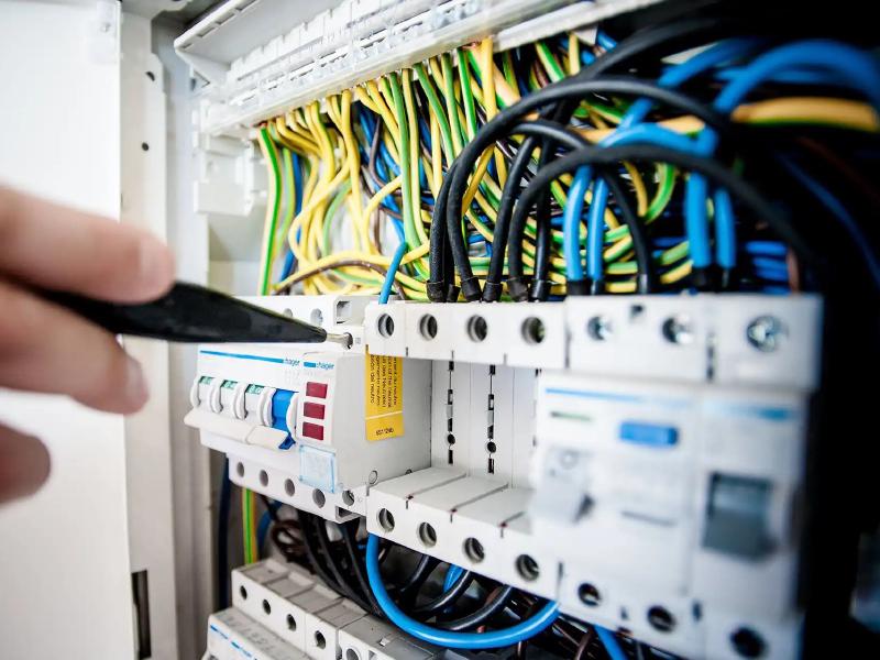 Electrician working on a switchboard