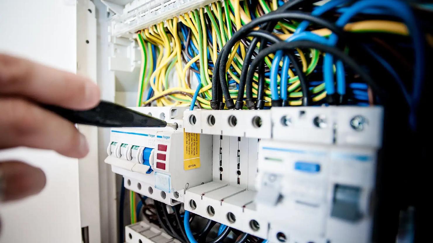 Electrician working on a switchboard