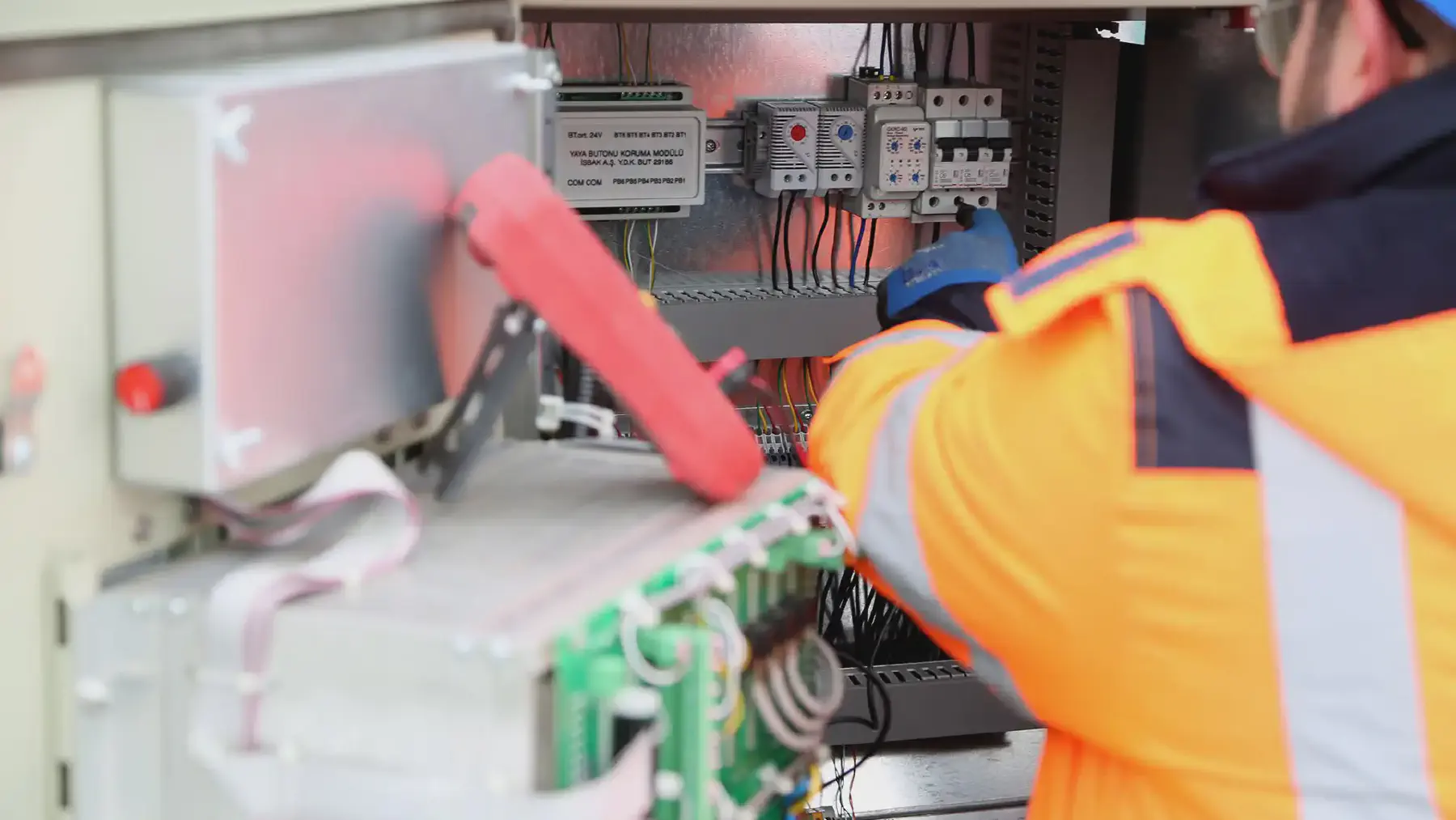 An industrial control cabinet with three phase distribution and terminal blocks