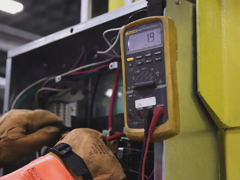 Multimeter reading taken at an electrical switchboard